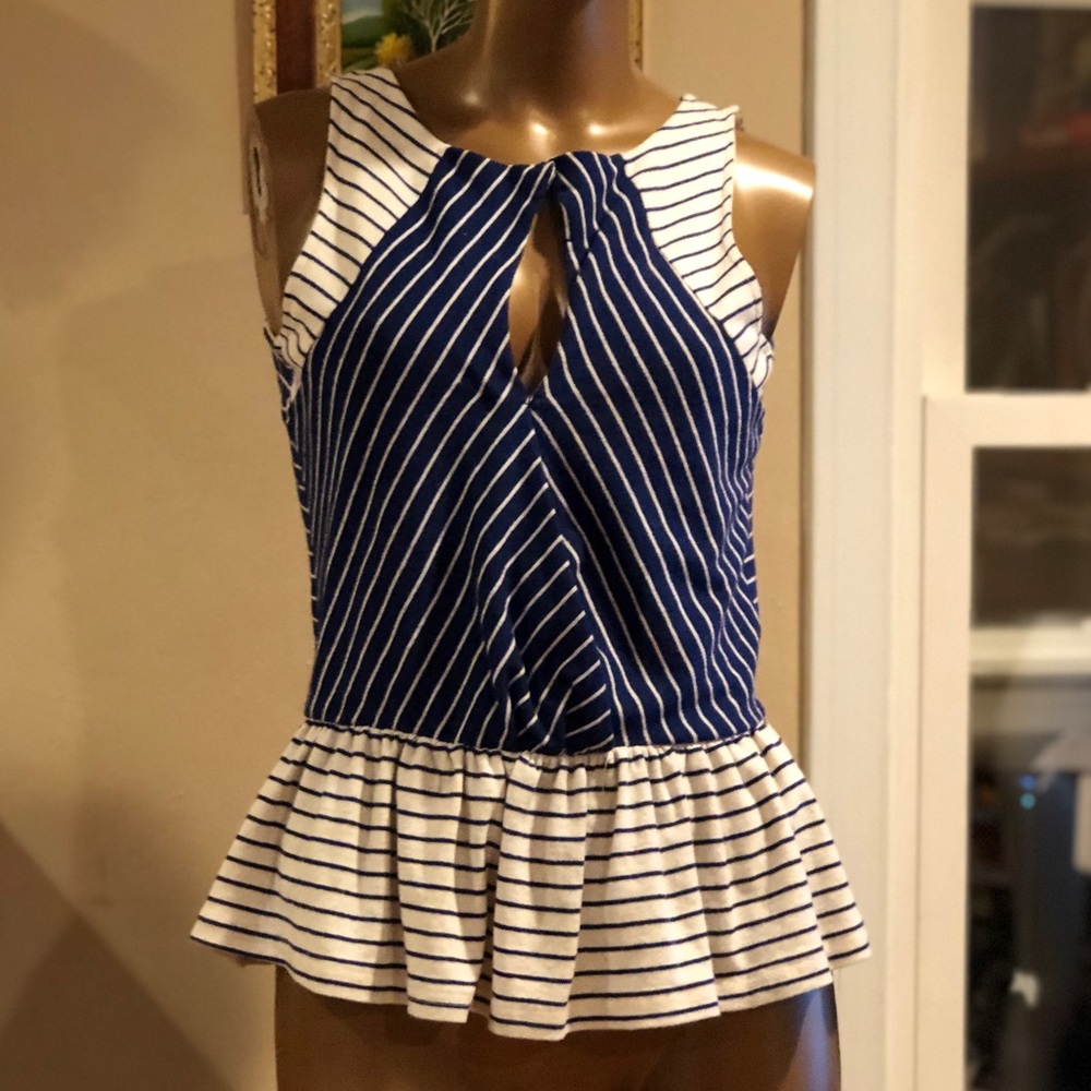 Peplum open back top size medium